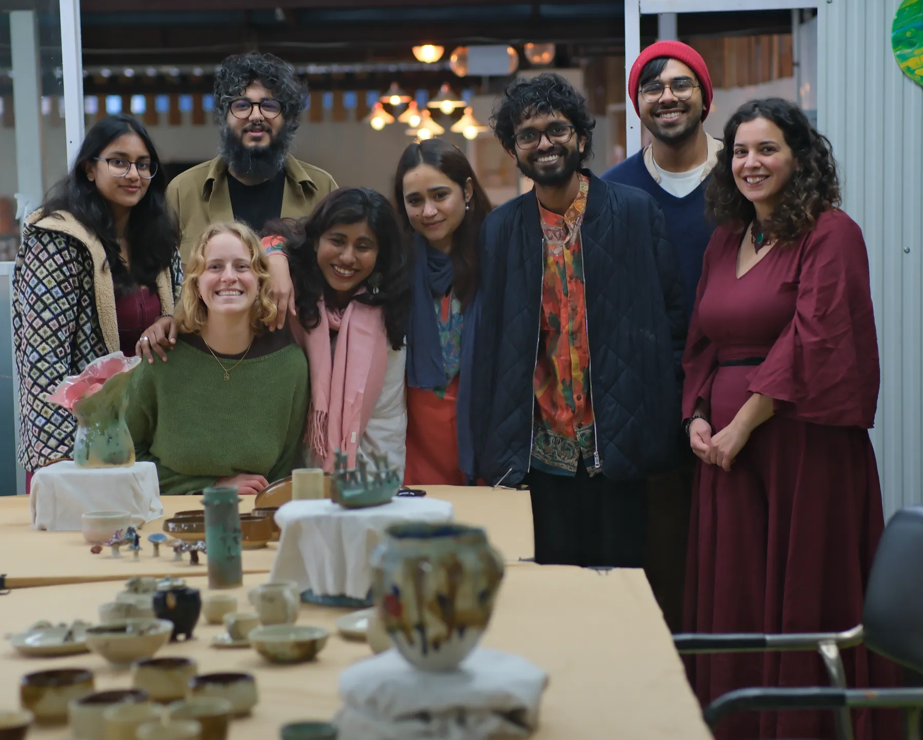 Pottery school course students practicing clay techniques at Dharamkot Studio Himachal Pradesh.